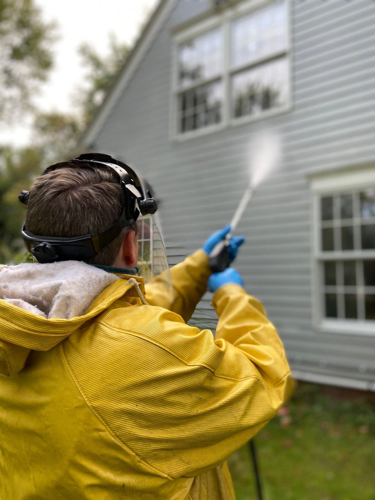 Stock photo: Pressure washing a house exterior