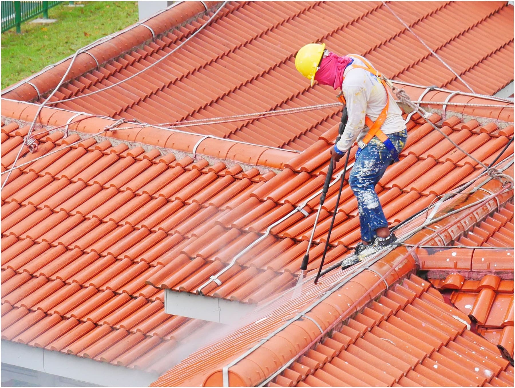 Stock photo: Worker pressure cleaning an exterior surface