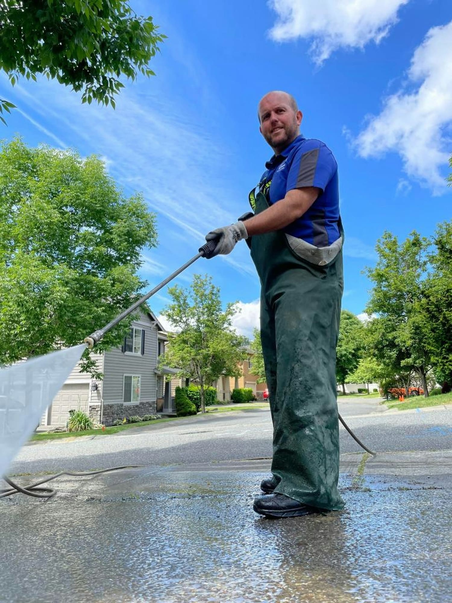 Stock photo: Pressure washing a residential driveway